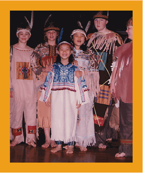 Josephine Hwang as The Little Doll with other cast members from the premier performances of The Legend of the Bluebonnet. photo: Susan Bingham